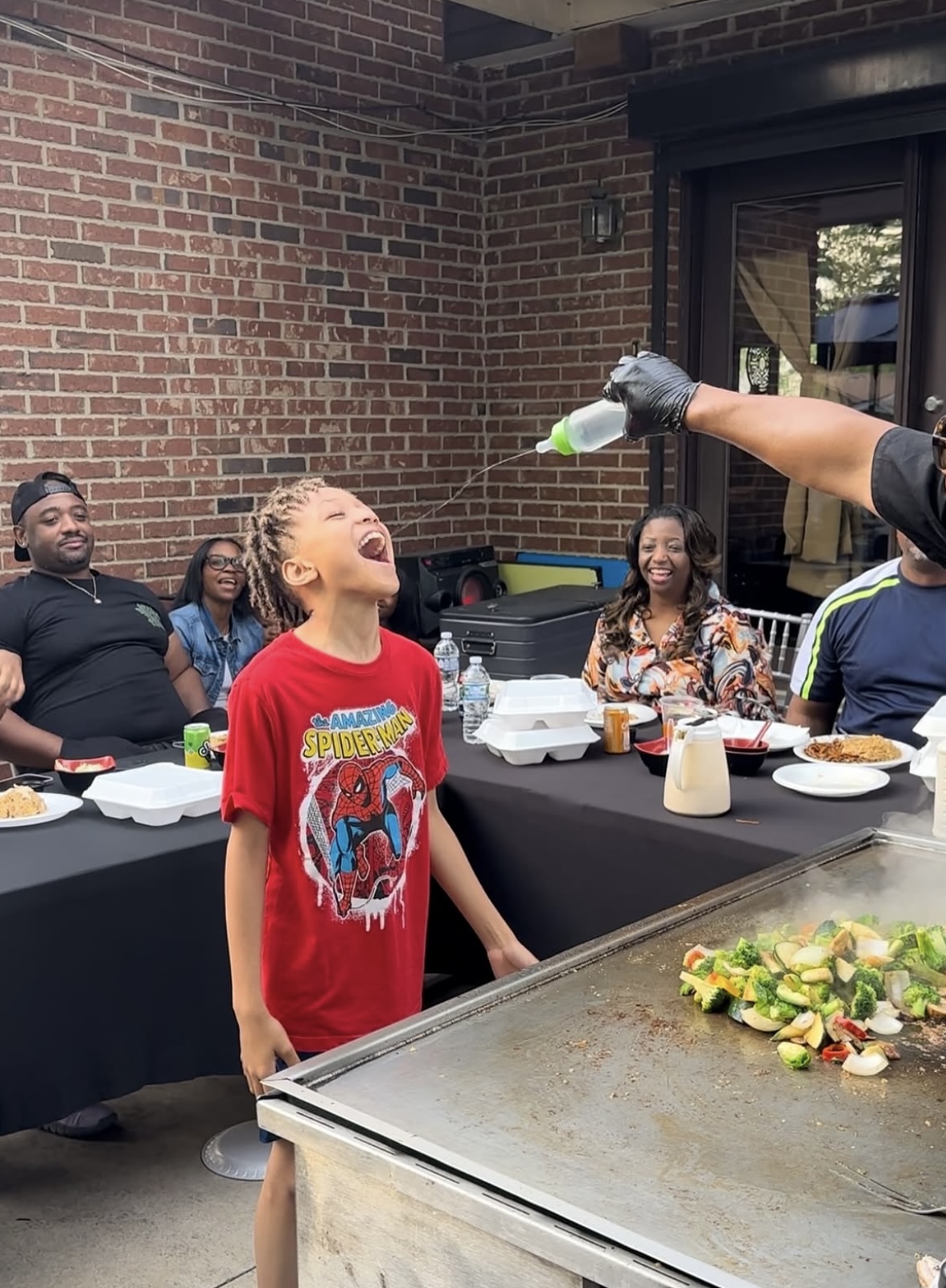 A fun hibachi moment with family